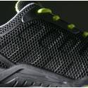 Zapato de seguridad negro y verde